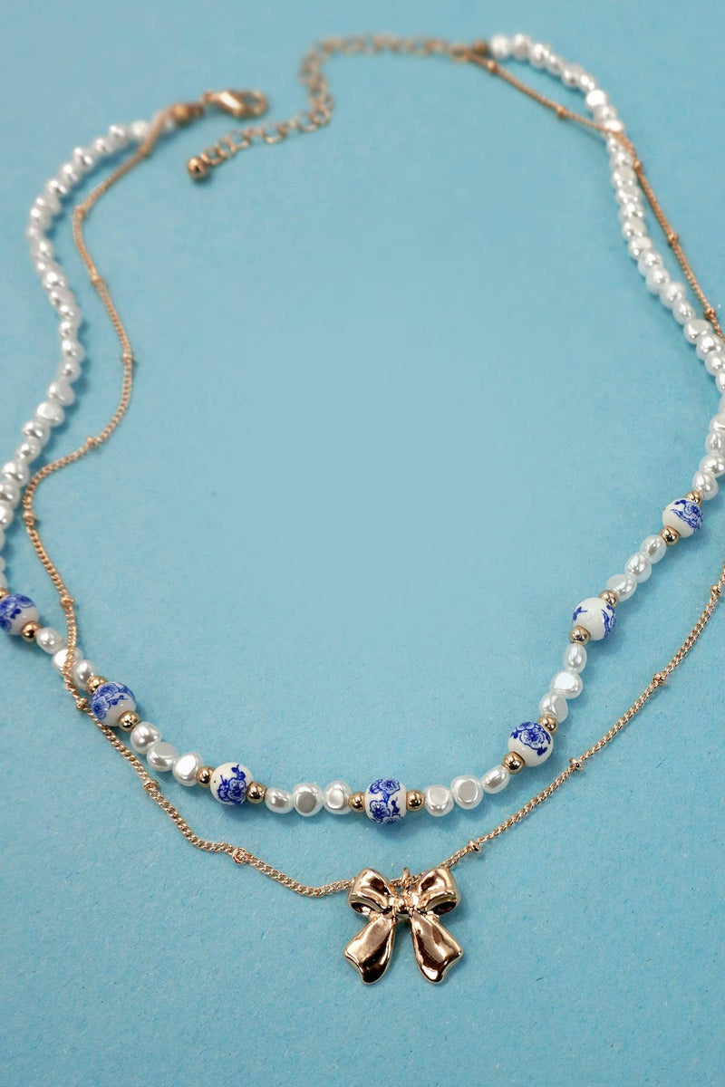 TANI by MINETANI ♥ Imperial Bow Pearl Necklace/追跡付 Designer fashion, Seoul-fully created | W Concept